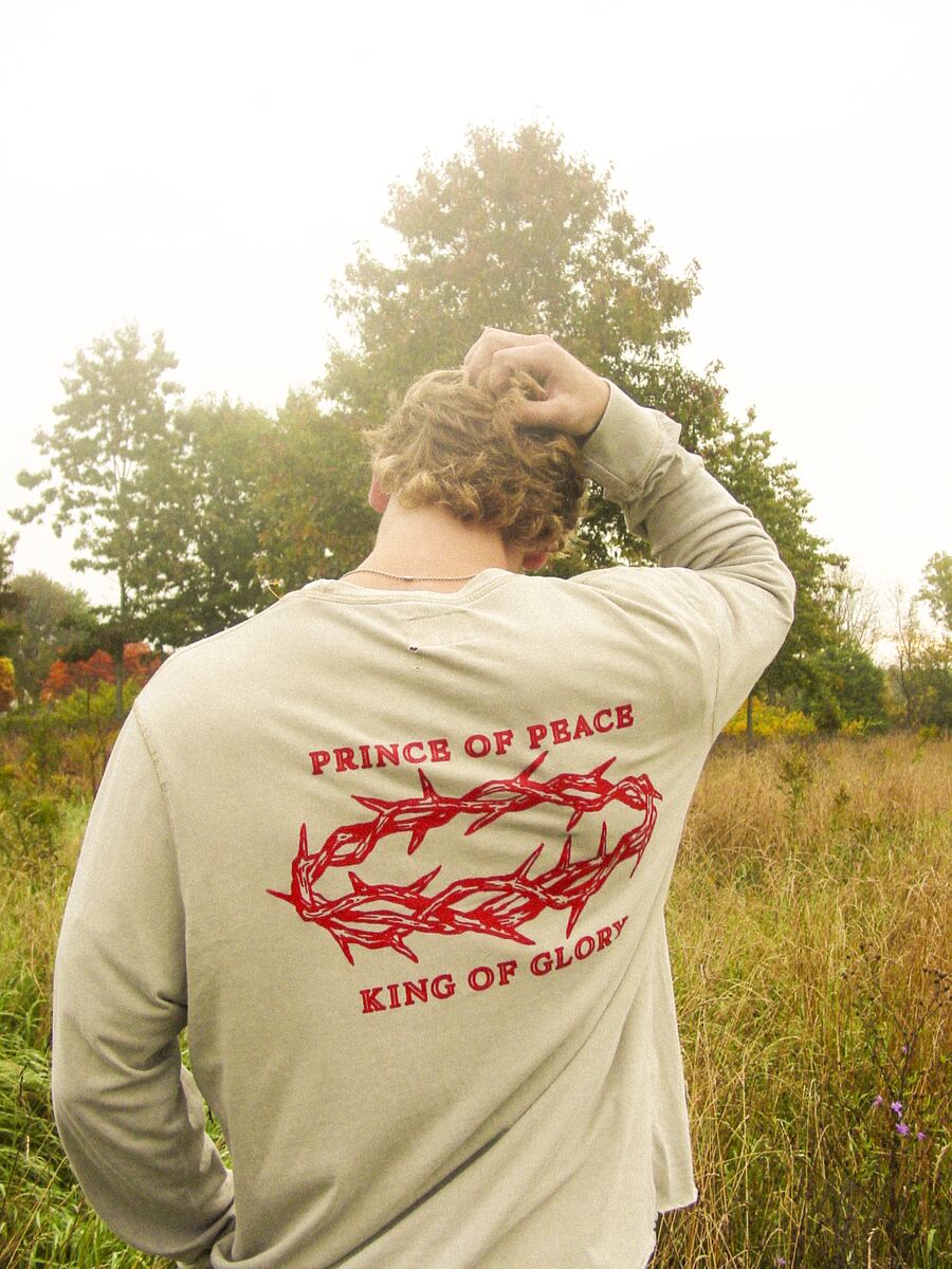 Tan long sleeve, back print: Prince of Peace in red